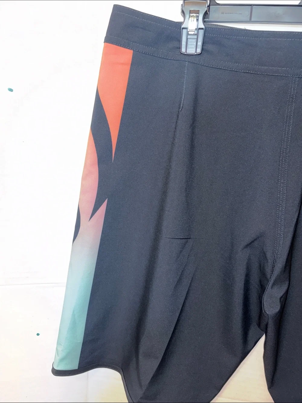 Quiksilver Men’s Black Boardshorts with Coral-to-Teal Gradient Panels